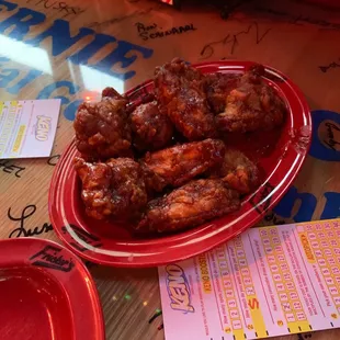 a plate of chicken wings