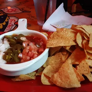 Chips and not so great tasting salsa.