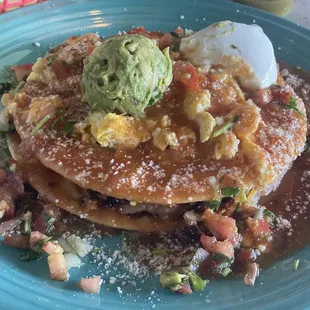 Huevos Rancheros and Chorizo plate. All the sauce on the side compliments the meal!  super delicious.
