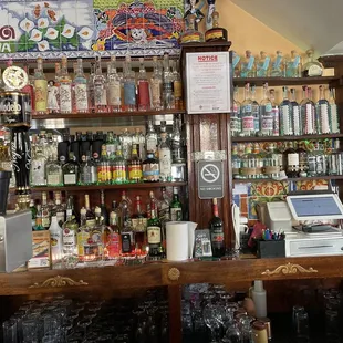 Some of the tequilas and mezcal with more beautiful tiles.