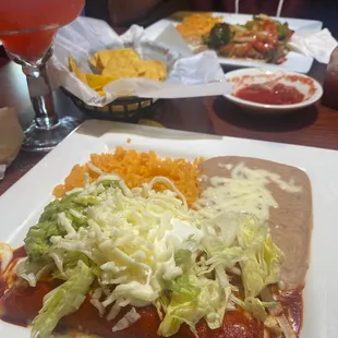 Chicken enchilada and strawberry margarita