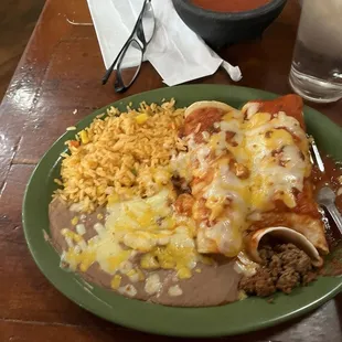 Burrito, enchiladas, rice and beans