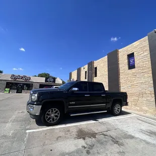 Parking lot in front of smoke shop