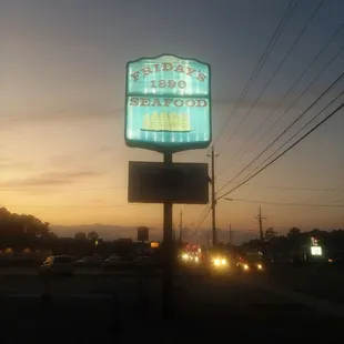 a neon sign for a restaurant