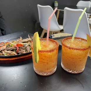 Mango mezcal cocktails and steak fajitas