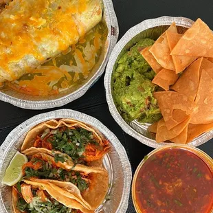 Consom birria, Guacamole and Chips, chicken Tinga Taco, burrito