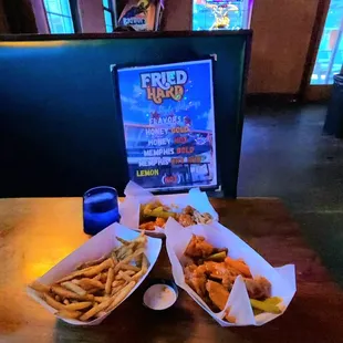 two baskets of food on a table