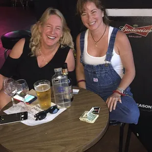 two women sitting at a table