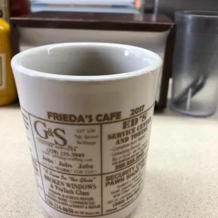 a coffee cup on a counter