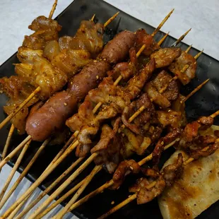 Mini sausage, beef tendon, and pork belly skewers