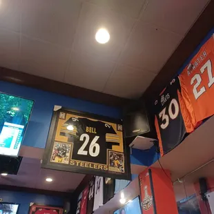 Bar area with signed and authenticated jersey by Bell from Pittsburgh Steelers