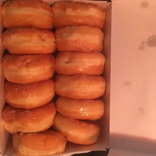 A dozen glazed donuts !