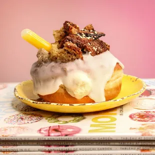 Passion Fruit Banana-french cream w/ brown butter glaze, topped with passionfruit butter-filled pipettes and a moist housemade toasted bread
