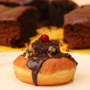 SEASONAL: Brownie Cheesecake - brownie, cheesecake, a layer of edible cookie dough with a cherry, brownie crumble, &amp; chocolate ganache