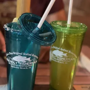 two cups with straws