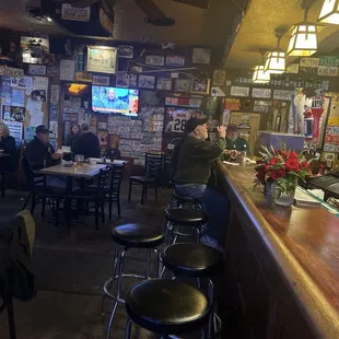 customers sitting at the bar