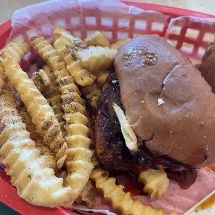 Blackened chicken sandwich and fries