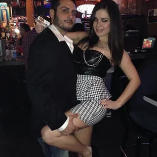 a man and a woman posing for a picture