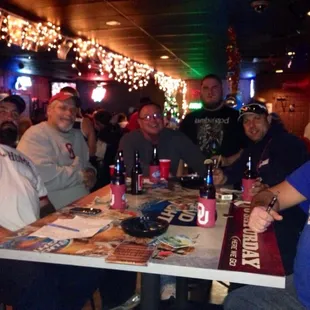 a group of people sitting at a table