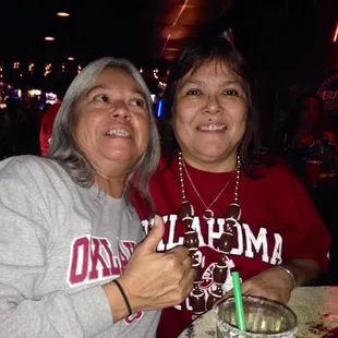 two women sitting at a table