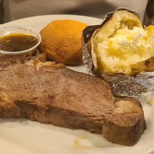 Medium Prime Rib with a perfectly baked potato