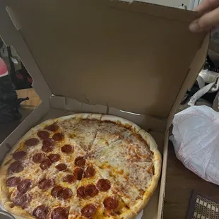 Half pepperoni , half cheese pizza !