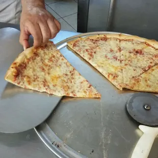 Unbeatable price, two slices and a soda for $3.50