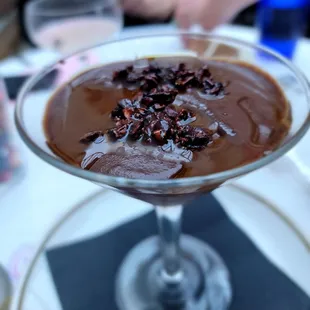 a chocolate dessert in a martini glass
