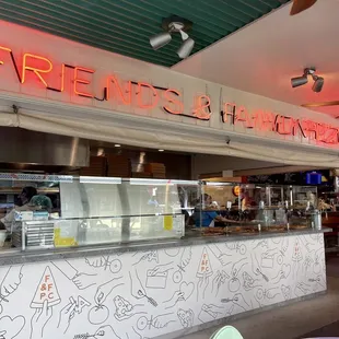 neon sign above counter