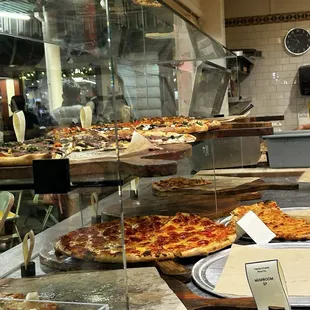 The pizzas to choose from.