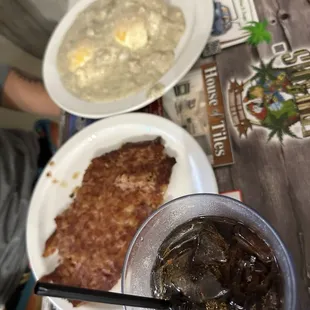 Biscuits Gravy and eggs with side of corned beef hash
