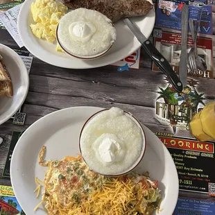 Veggie omelet + Steak N Eggs w/ grits