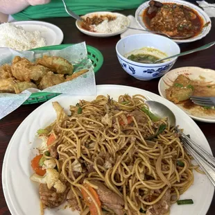 Try the deep fried gourd appetizer.  Excellent.  And so was the stir fried egg noodle dish (with pork).