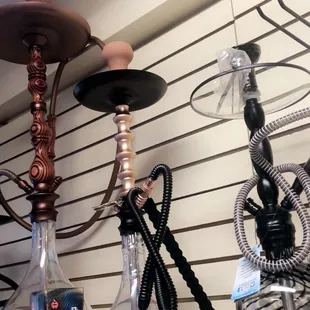 a variety of hooks hanging on a wall