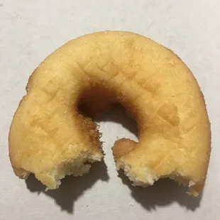 a half eaten donut