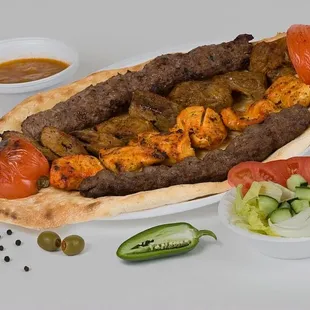 a plate of food and a bowl of salad