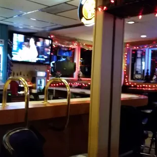 a bar and televisions