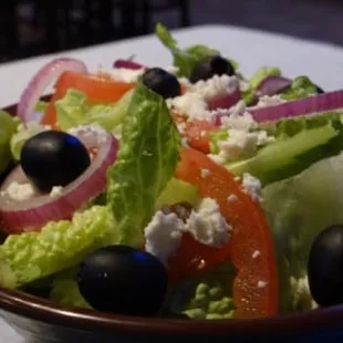 a salad in a bowl on a table