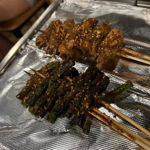 Green beans and pork belly wrapped enoki mushrooms skewers