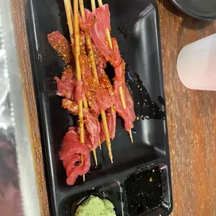 Raw beef skewers