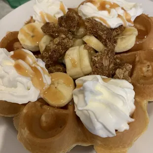 Caramel crunch waffle with granola, bananas and caramel syrup