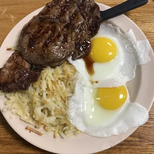 steak and eggs on a plate