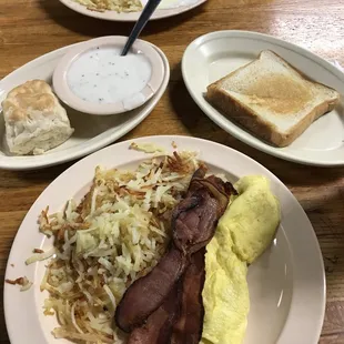 bacon, eggs, hash browns and toast
