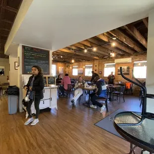 a group of people sitting at tables