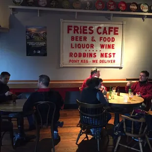 a group of people sitting around a table