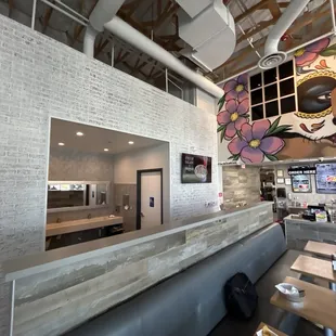 Wider view of the bathroom sink as you order your food.