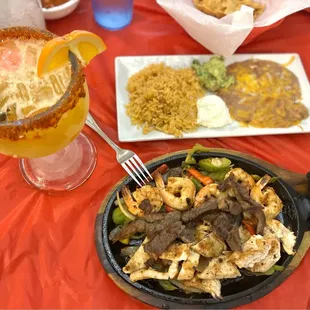 Mango margarita and Any 2 Fajitas Specialty Plate