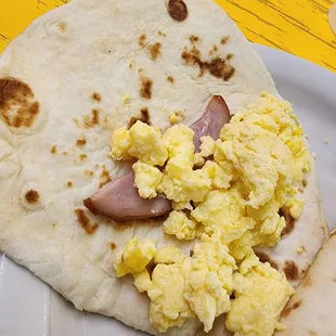 A single slice of ham with egg