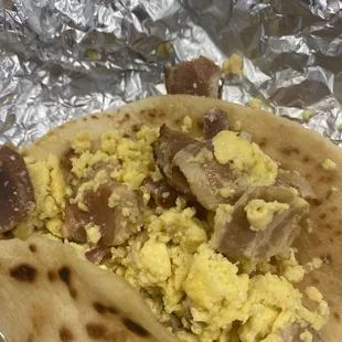 Ordered bacon egg taco. I've never had a  BOILED bacon with egg taco!! GROSS