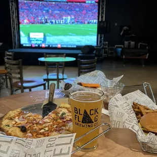 BBQ chicken pizza, wings (they only have one sauce), steak and cheese egg rolls and a burger.